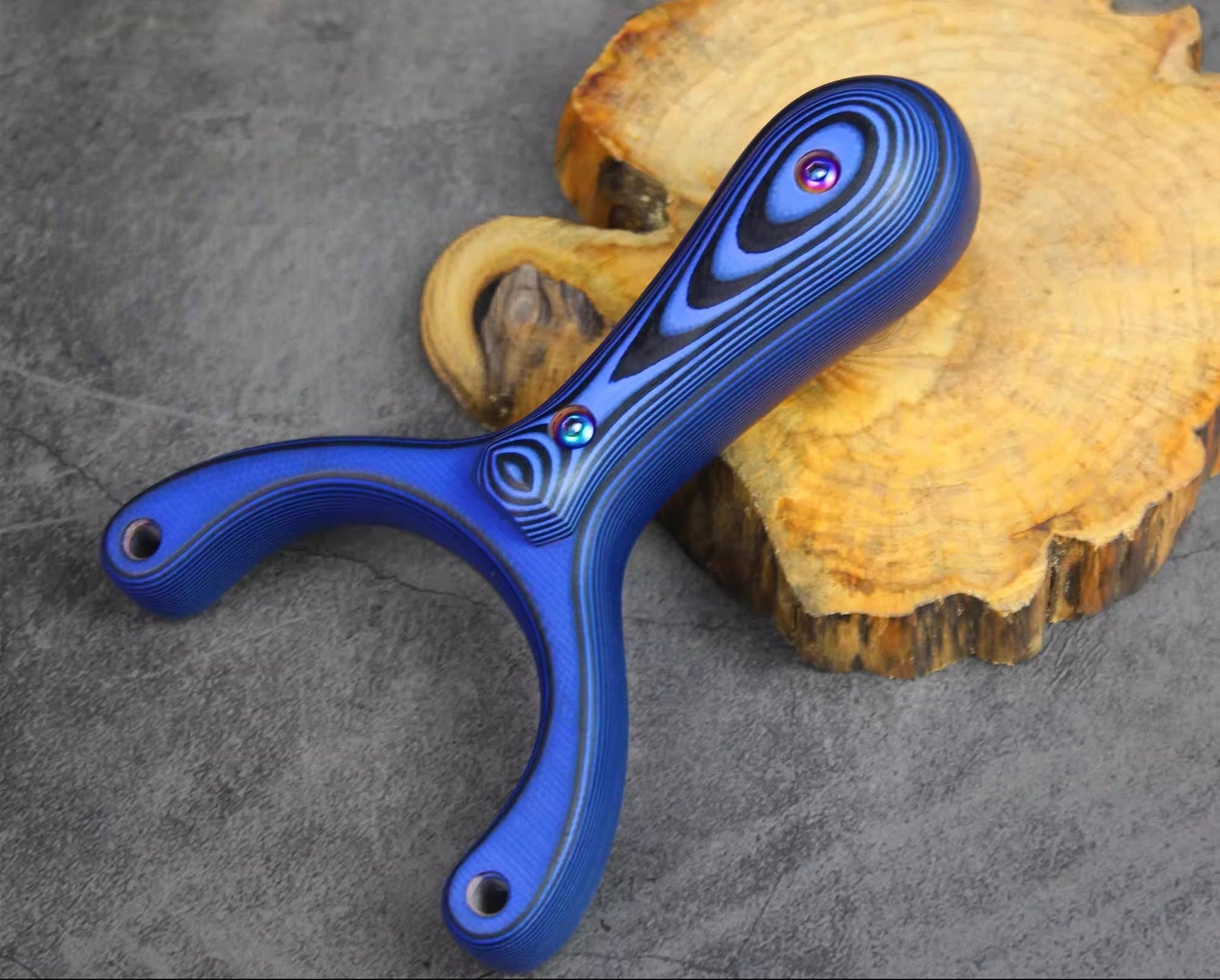 X31 slingshot with comfortable hand-polished grip and balanced design for accurate and fatigue-free shooting control.