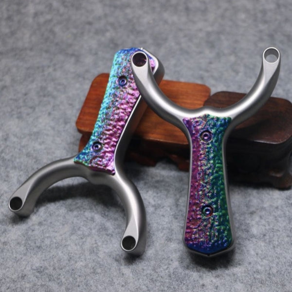 Sea Wave-X27 dual-band compatible titanium slingshot with bead-lock head, perfect for both tube and flat band shooting styles.