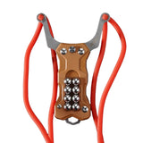 All-in-one TitanShot-X24 outdoor survival slingshot with dual band compatibility, folding knife, and emergency glass-breaking tip.
