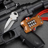 Lightweight TitanShot-X24 compact tactical slingshot with durable stainless steel construction and quick-change rubber band design.