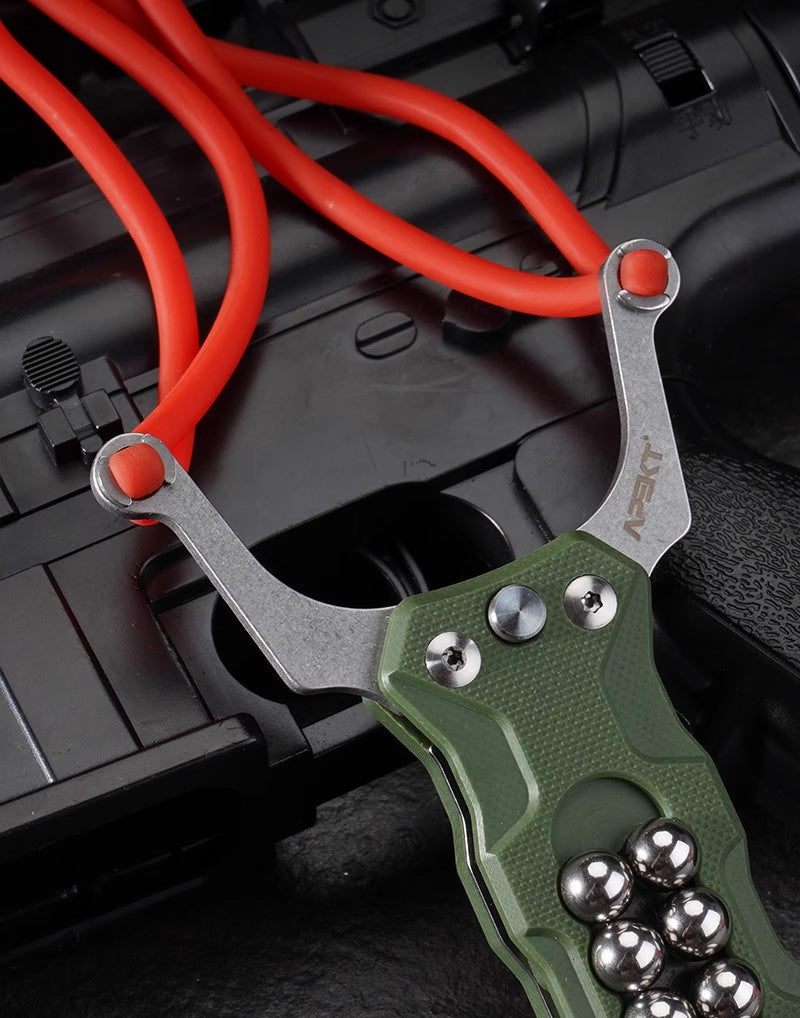 TitanShot-X24 ergonomic grip slingshot with stainless steel fork and G10 handle, built for long-term comfort and shooting accuracy.