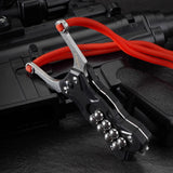 TitanShot-X24 portable slingshot engineered for outdoor survival with dual-compatible bands and bead-stuck quick attachment system.