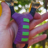 Pocket Snipe X13 compact stainless steel slingshot with purple and black finish for precise, accurate shooting.