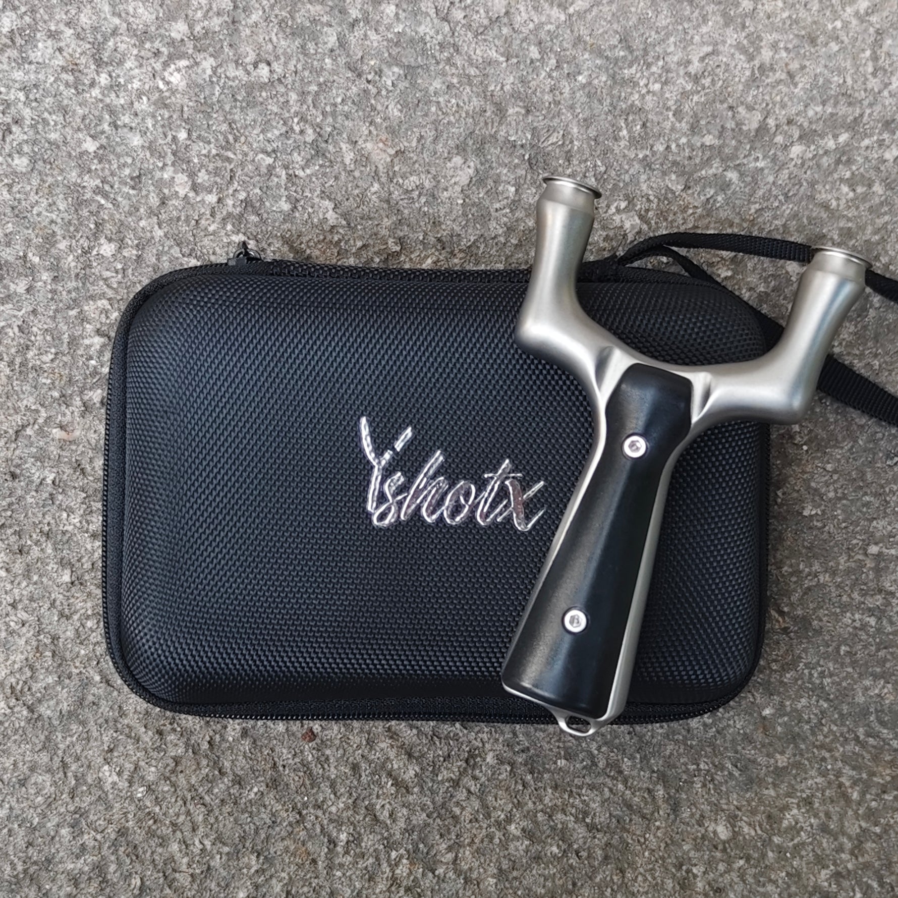 Predator X28 stainless steel slingshot with ergonomic grip and hand-polished fork tips for extended band life, precision accuracy, and durable performance.