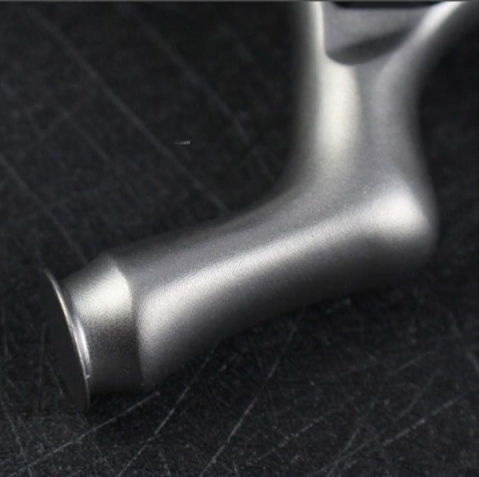 Premium Predator-X28 target shooting slingshot with sleek polished finish and ergonomic handle for precise control.