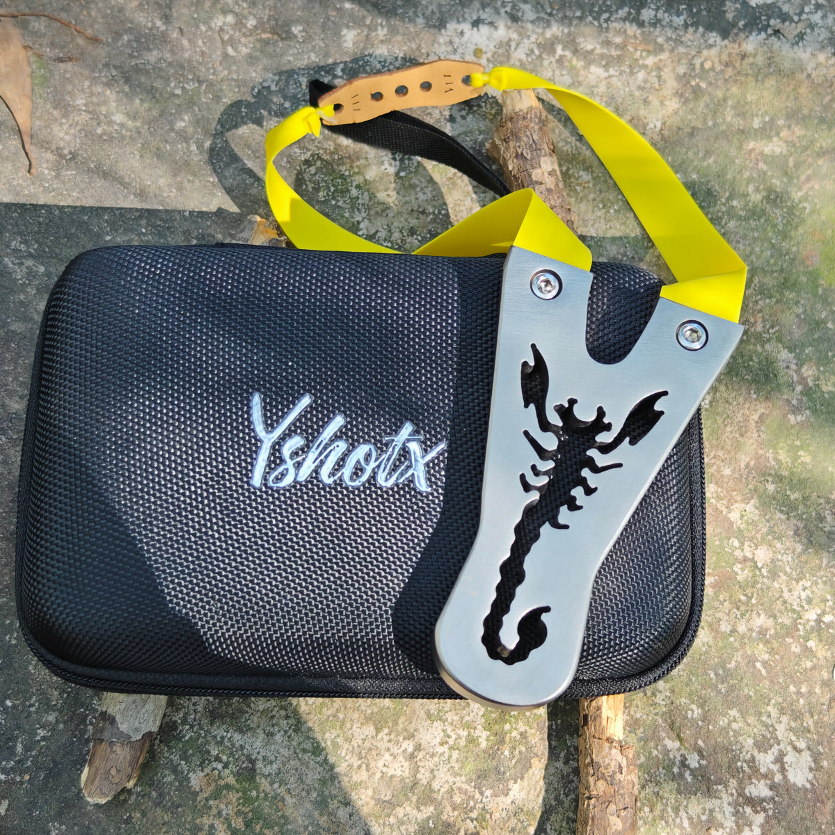 Shadow Scorpion X14 stainless steel slingshot with CNC flat-block design and engraved scorpion pattern, built for expert shooters seeking precision and power.
