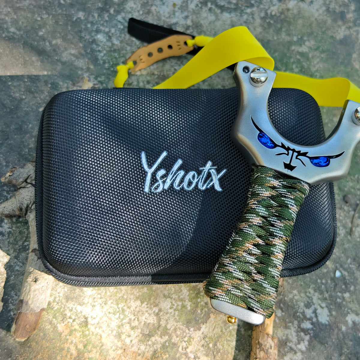 Sneaky IMP X05 stainless steel slingshot with ergonomic recurve design, jungle-style anti-slip hand rope, and CNC precision finish for stable and accurate outdoor shooting.