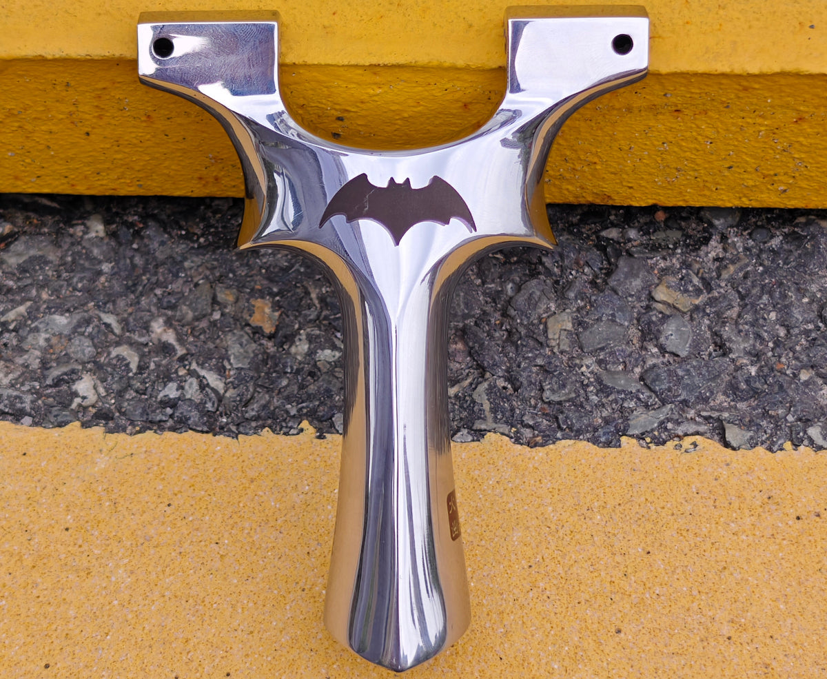 stylish black bat slingshot for outdoor fun
Eye-catching black bat motif slingshot for both sport and display.