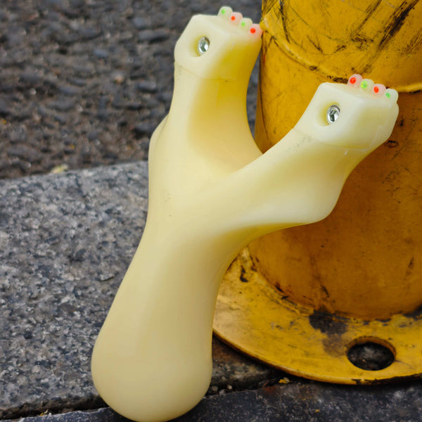 High-performance White General resin slingshot ideal for target practice and hunting.