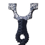 Z09-Shadow Samurai titanium slingshot with handcrafted dark gold finish for precision shooting.