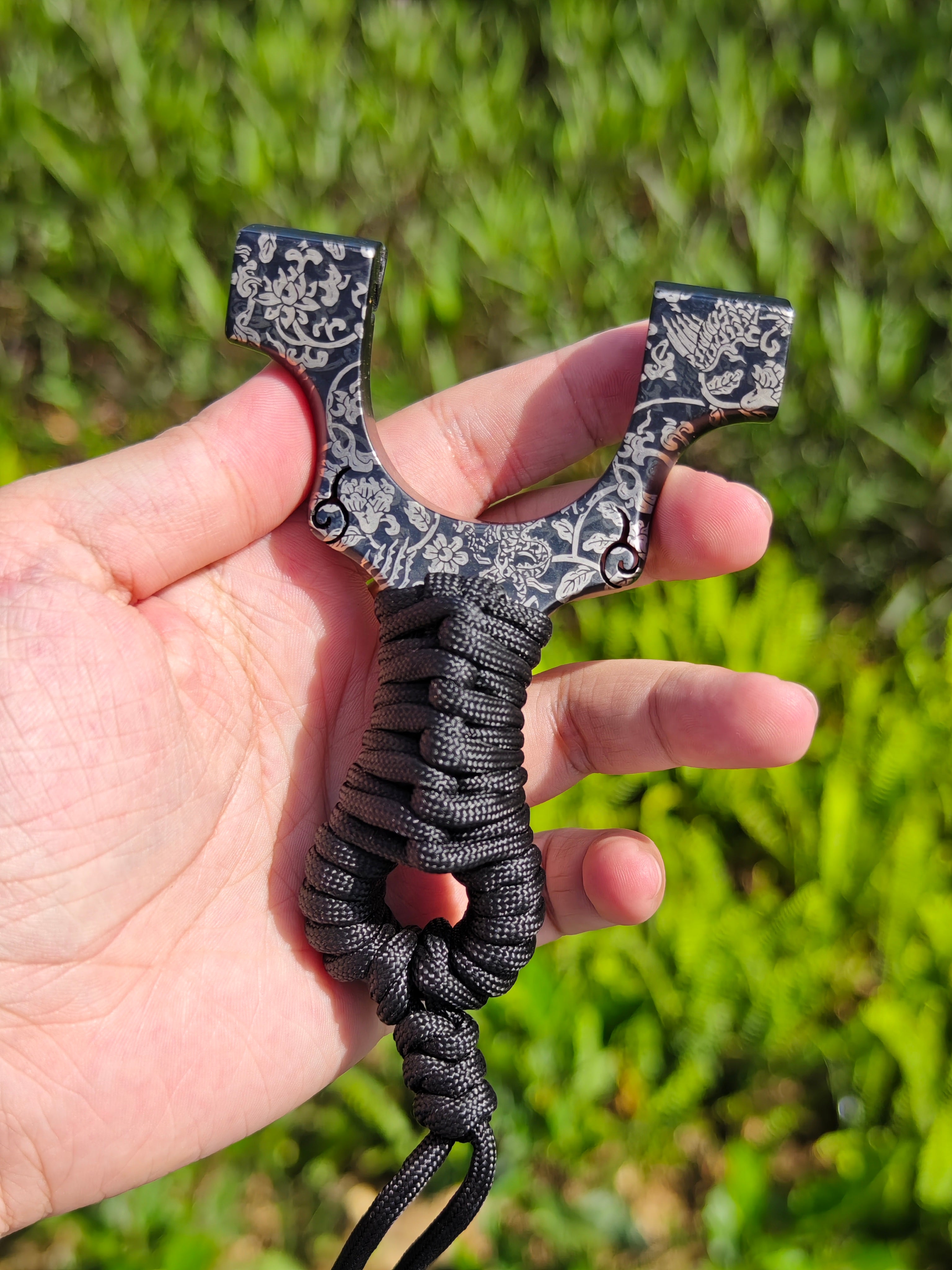 Lightweight Z09-Shadow Samurai outdoor slingshot made from durable TC21 titanium alloy.