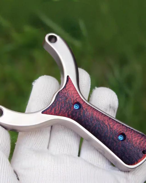 Detailed view of rounded fork tips on Sea wave-X23 slingshot to prevent band wear and extend latex band lifespan.