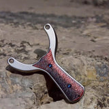 Close-up of slingshot throat measuring 64mm for ergonomic grip, designed to improve control and reduce hand strain.