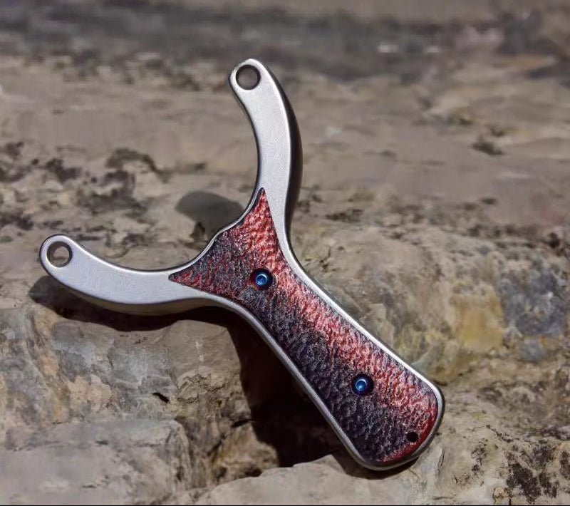 Close-up of slingshot throat measuring 64mm for ergonomic grip, designed to improve control and reduce hand strain.